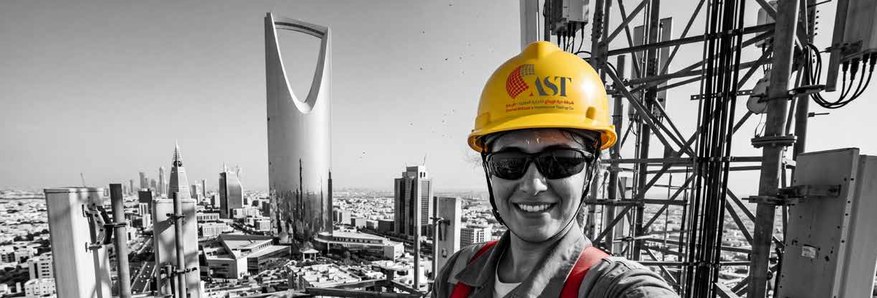 AST engineer above the Riyadh skyline